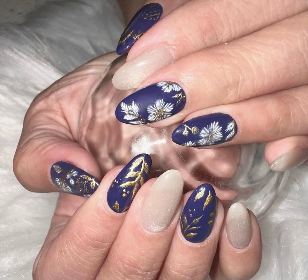 Navy and gold floral hand-painted Japanese gel nail art at Mega Japanese Nail, nail art NYC in Chelsea