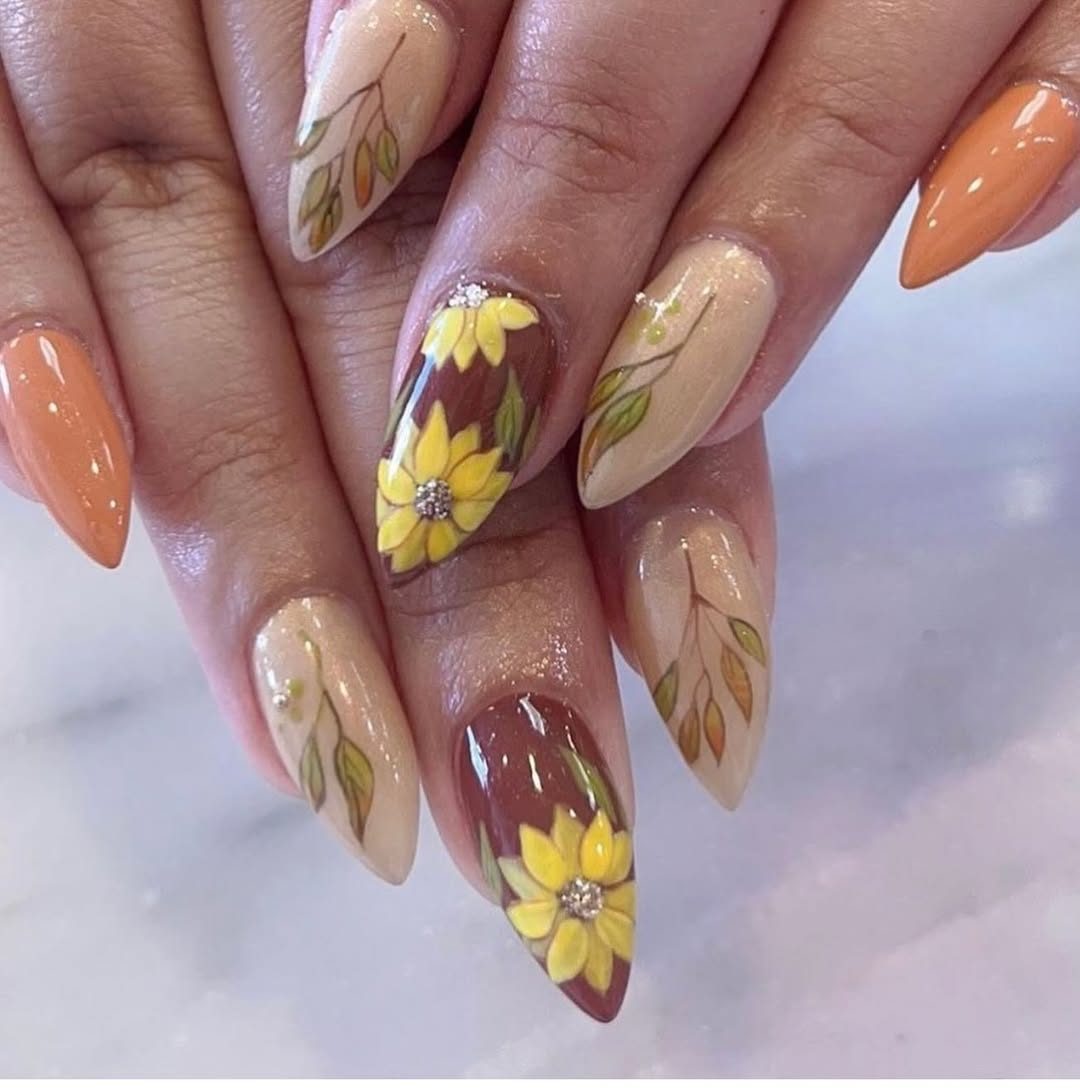 Hand-painted floral nail art with crystal gem detail at Mega Japanese Nail, nail art NYC Chelsea