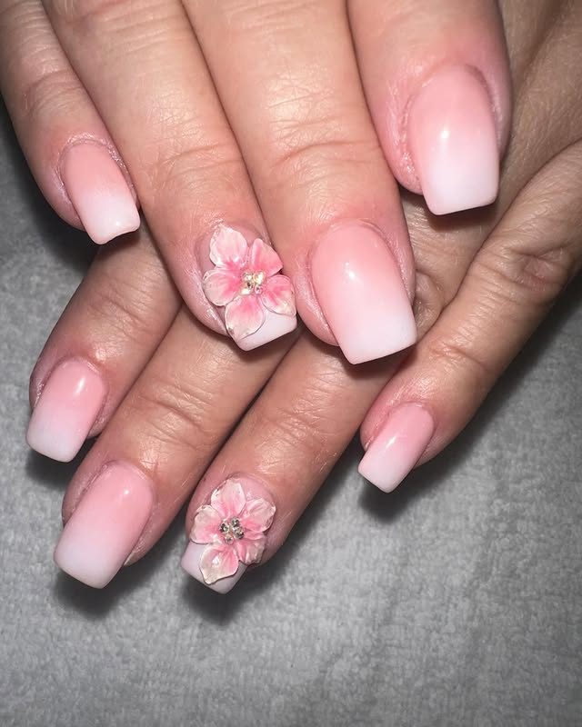 Soft pink ombre nails with hand-painted 3D floral nail art at Mega Japanese Nail, nail art NYC in Chelsea