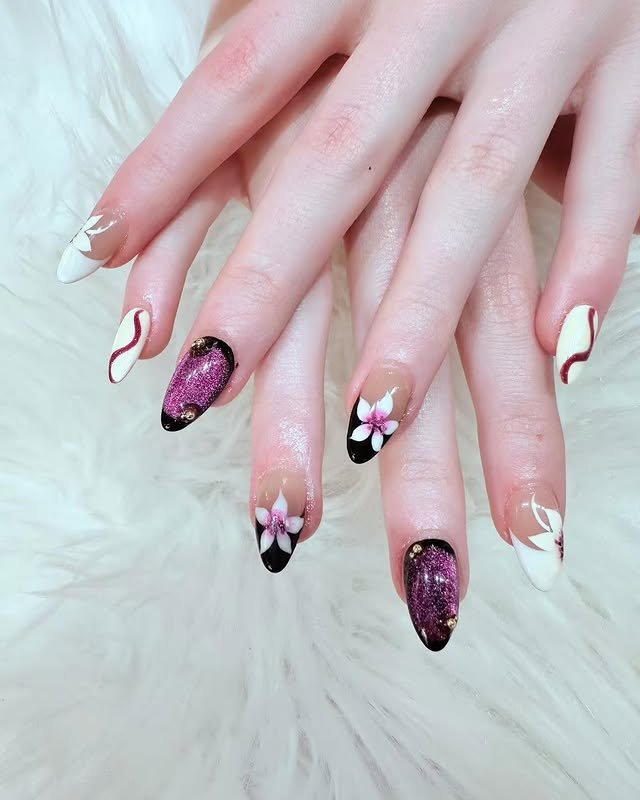 Magenta glitter and floral Japanese gel nail art at Mega Japanese Nail, a refined beauty studio in Chelsea, NYC