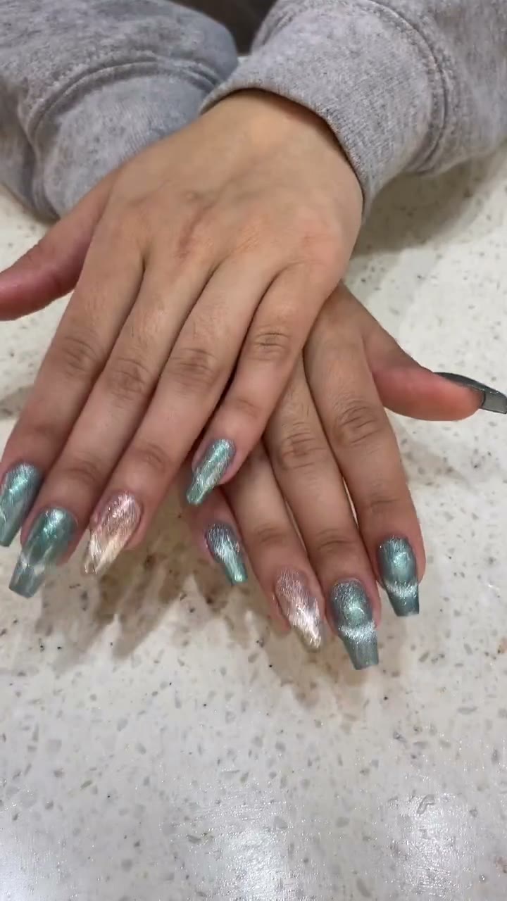 Emerald green cat-eye Japanese gel nails at Mega Japanese Nail NYC