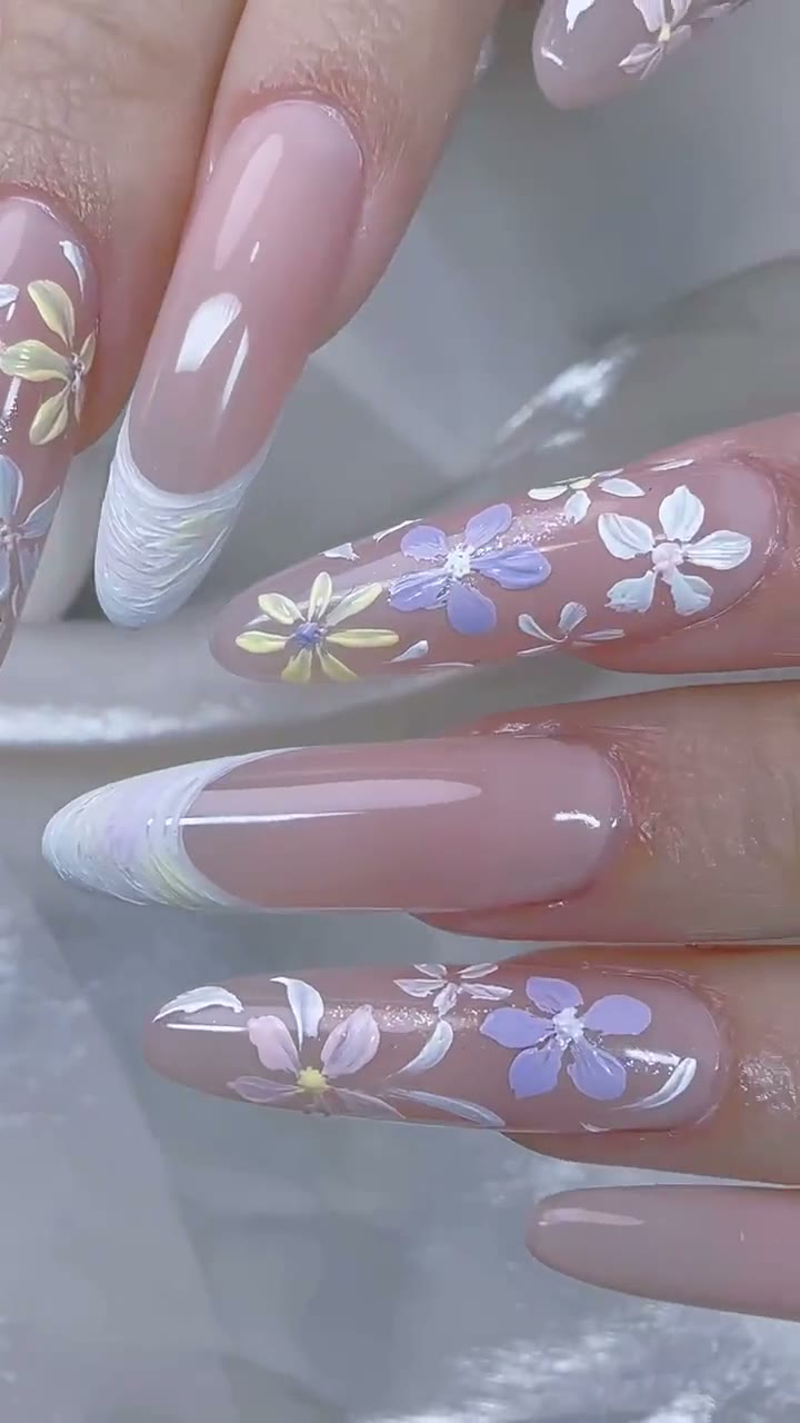French tip nails with purple floral nail art at Mega Japanese Nail Chelsea